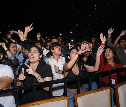 SICSR students cheering at a campus event